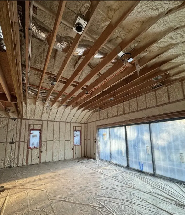 Interior walls and ceiling insulated with spray foam during new construction in Franklin